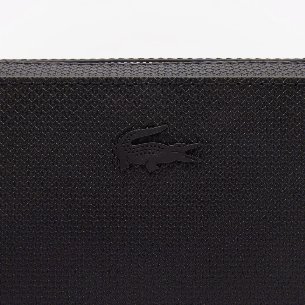 Trousse zippée ChanTrousse zippée Chantaco en cuir piquétaco en cuir piqué