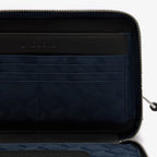 Trousse zippée ChanTrousse zippée Chantaco en cuir piquétaco en cuir piqué
