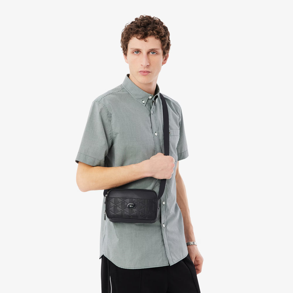 Sacoche verticale monogramme en cuir